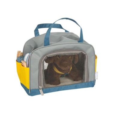 Perro con bolsa de transporte y set de cuidados