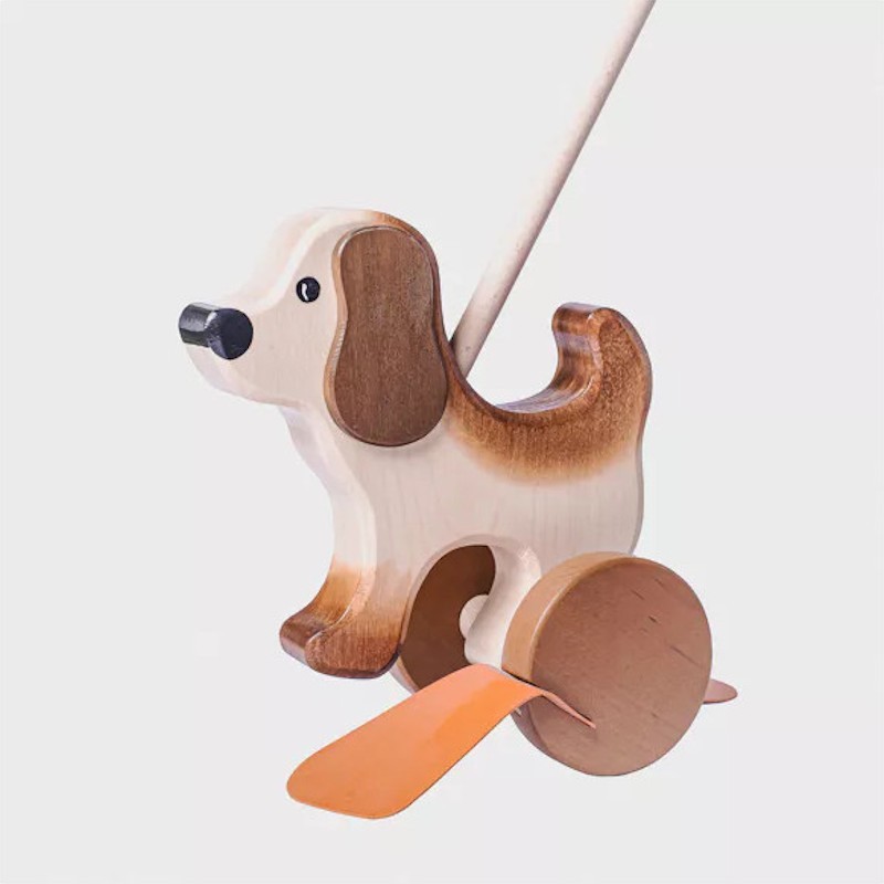 Wooden dragging dog with stick